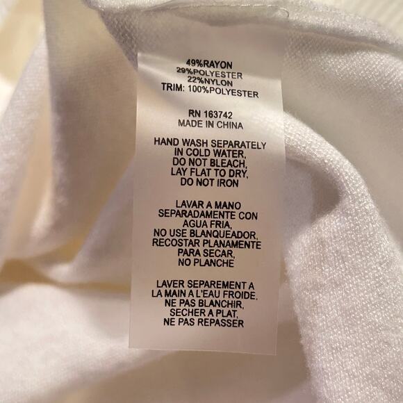 Sioni Sweater - 
Mixed Media Long Sleeved
Mock neck white size small NWT - Picture 4 of 5